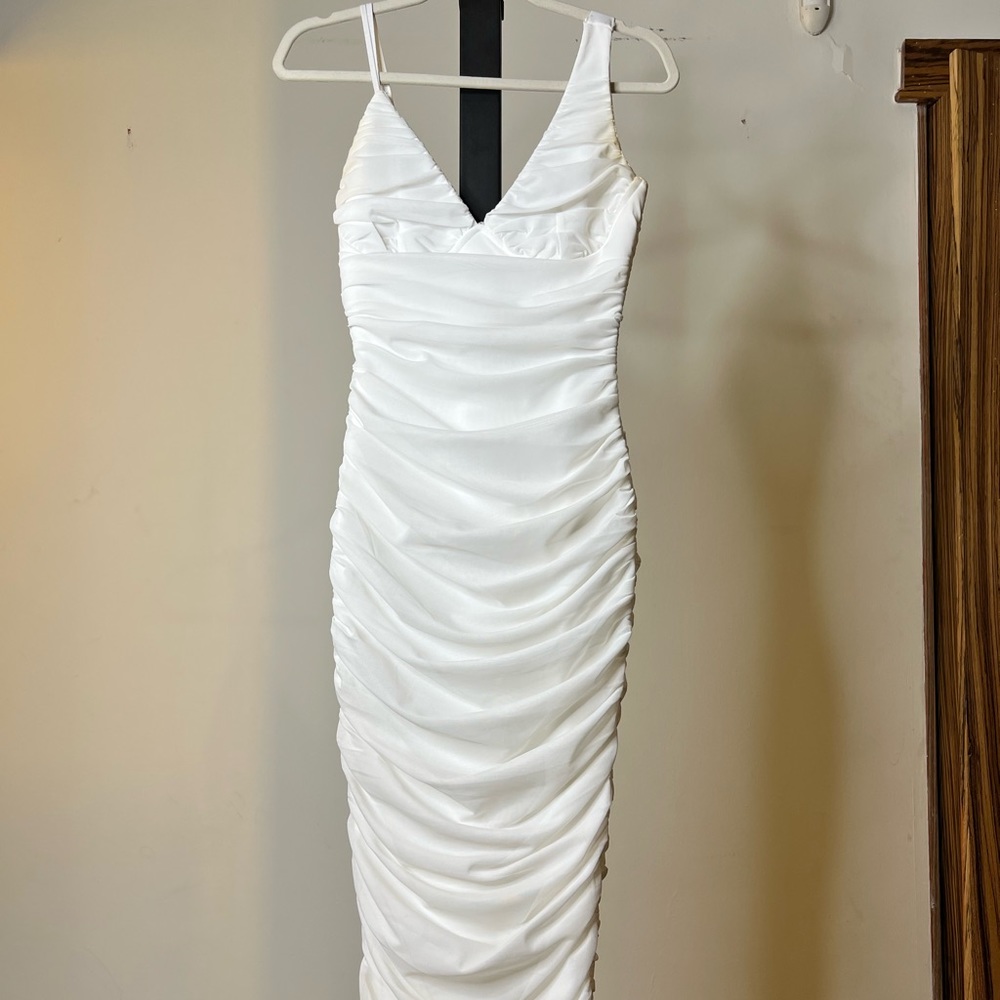 Beautiful curve hugging white layered dress